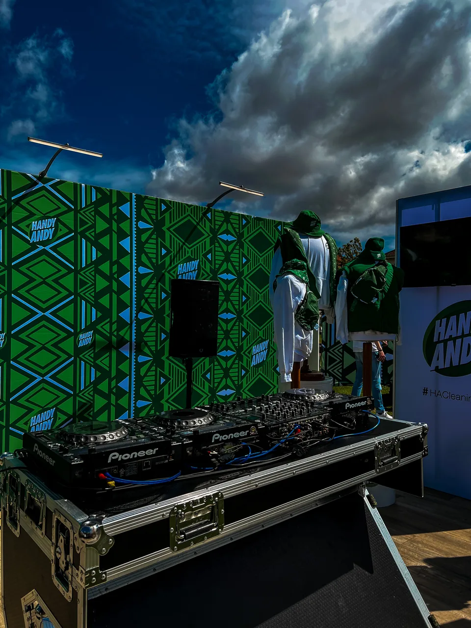 DJ equipment and speakers at an outdoor brand activation
